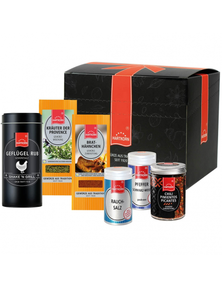 Schwarze Geschenkbox mit sieben Gewürzen in Dose, Flachbeutel, Glas und Streuer – ideal für Geflügelgerichte.