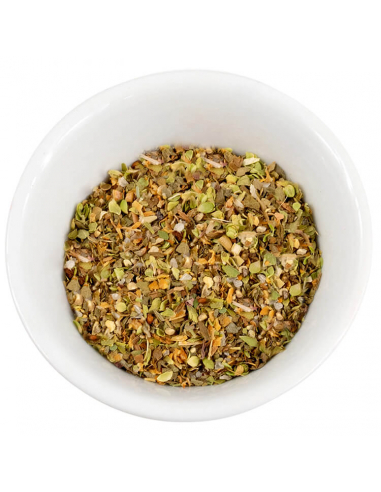 Weiße Schale, gefüllt mit fein gehackter Kräuter- und Gewürzmischung in Grün-, Gelb- und Brauntönen.