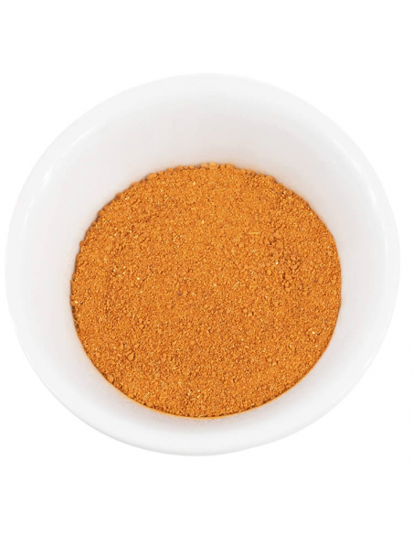 ChatGPT:
Eine weiße Schale gefüllt mit feinem, orangefarbenem Gewürzpulver.