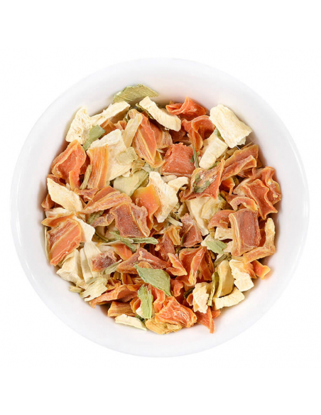 Schale mit getrockneten Gemüse- und Kräuterstücken in Orange und Grün