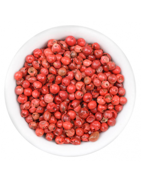 Glänzend rosa Beeren mit glatter Oberfläche in weißer Schale, von oben fotografiert Glänzend rosa Beeren mit glatter Oberfläche in weißer Schale, von oben fotografiert