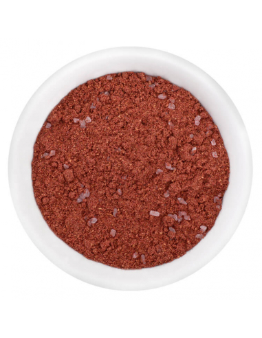 Violett-rotes Purple Currypulver mit groben Salzstückchen in weißer Schale, von oben fotografiert