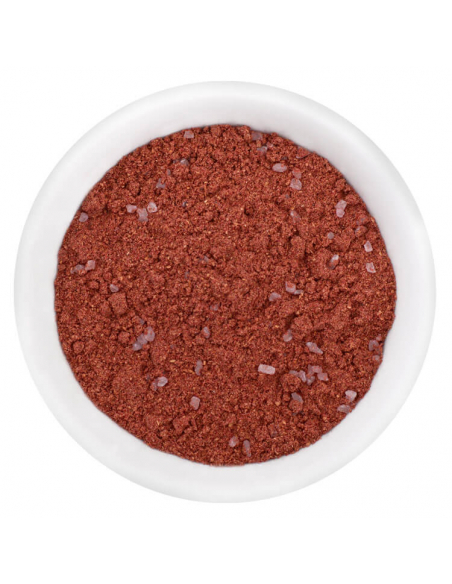 Violett-rotes Purple Currypulver mit groben Salzstückchen in weißer Schale, von oben fotografiert