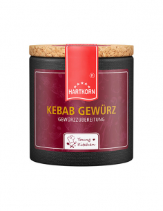 Pappdose mit Korkdeckel und dunkelrotem Etikett, beschriftet mit „Kebab Gewürz".