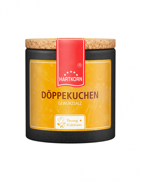 Pappdose mit Korkdeckel und orangefarbenem Etikett, beschriftet mit „Döppelkuchen“.