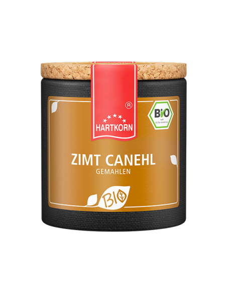 Dunkle Pappdose mit braunem Etikett, Aufschrift ‚ZIMT CANEHL GEMAHLEN‘ und Bio-Siegel Dunkle Pappdose mit braunem Etikett, Aufschrift ‚ZIMT CANEHL GEMAHLEN‘ und Bio-Siegel