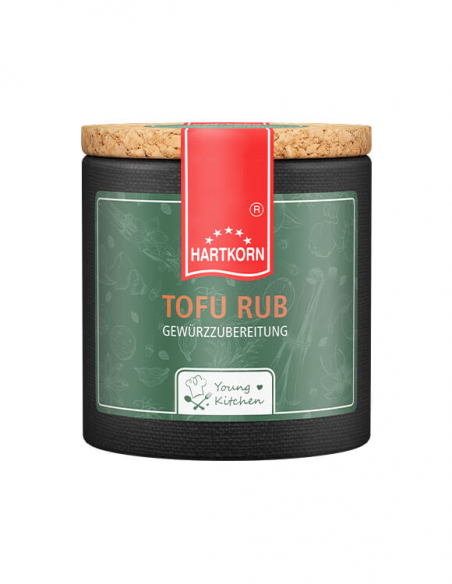 Pappdose mit Korkdeckel und grünem Etikett, beschriftet mit „Tofu Rub“. Pappdose mit Korkdeckel und grünem Etikett, beschriftet mit „Tofu Rub“.