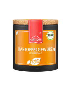 Schwarze Pappdose mit orangefarbenem Etikett, rotem Deckelband und der Aufschrift „KARTOFFELGEWÜRZ“.