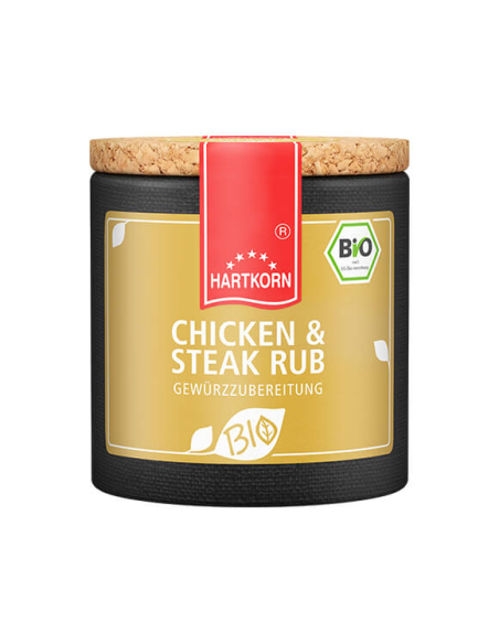 Pappdose mit rotem Etikettband und goldgelbem Etikett mit der Aufschrift „CHICKEN & STEAK RUB GEWÜRZZUBEREITUNG“