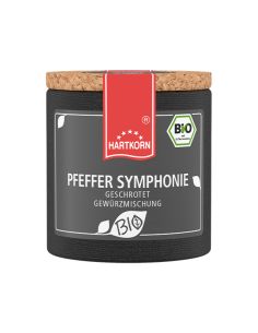 Pappdose mit rotem Etikettband und grauem Etikett mit der Aufschrift „PFEFFER SYMPHONIE GESCHROTET GEWÜRZMISCHUNG“.