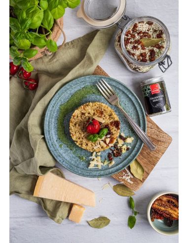 Spice in application - herb risotto with dried tomatoes