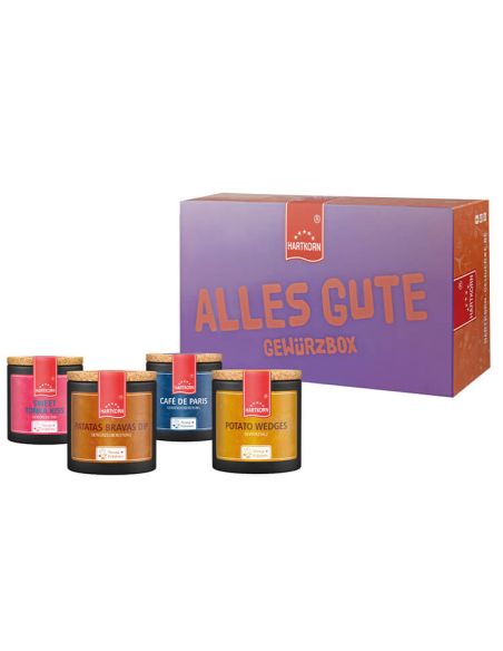 Violett-orangefarbene Box mit der Aufschrift „Alles Gute Gewürzbox“, davor fünf farbige Pappdosen mit Gewürzen.