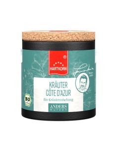 Schwarze Pappdose mit Korkdeckel, Etikett in Blau mit rotem Band: 'Hartkorn Kräuter Cote d´Azur', BIO-Siegel sichtbar.