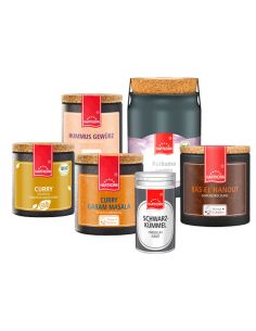Orientalisches Gewürzset mit sechs Gewürzen  in kräftigen Farben wie Gelb, Rot und Schwarz.
