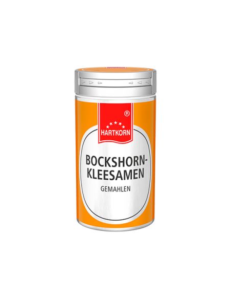 Dose mit orangefarbenem Etikett, Aufschrift: „Hartkorn Bockshornkleesamen gemahlen“ Dose mit orangefarbenem Etikett, Aufschrift: „Hartkorn Bockshornkleesamen gemahlen“