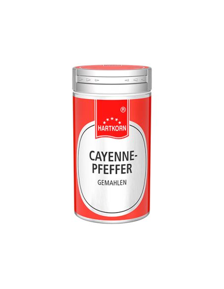Gewürzdose mit blauem Etikett und rotem Deckel, Aufschrift „Cayennepfeffer – gemahlen Gewürzdose mit blauem Etikett und rotem Deckel, Aufschrift „Cayennepfeffer – gemahlen