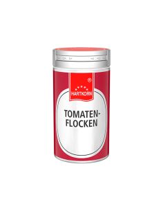 Rote Gewürzdose mit silbernem Deckel, weißem Etikett und rotem Hartkorn-Logo. Aufschrift: „Tomatenflocken"