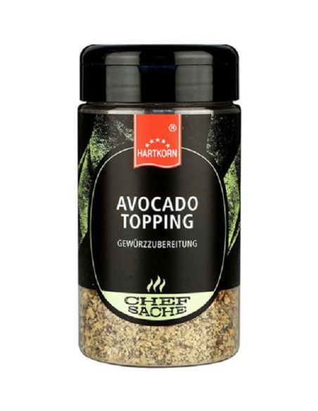 Schwarze Gewürzdose mit grünem Etikett und der Aufschrift „Avocado Topping“.