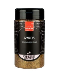 Schwarze Gewürzdose mit rotbraunem Etikett und der Aufschrift „Gyros“.
