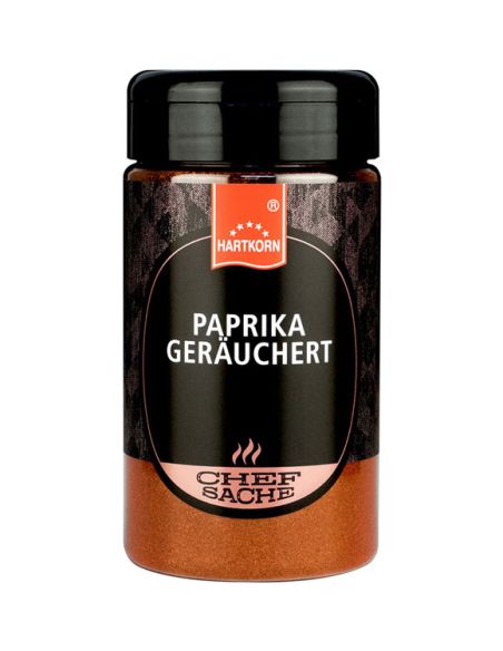 Schwarze Gewürzdose mit orangefarbenem Etikett und der Aufschrift „Paprika Geräuchert“.