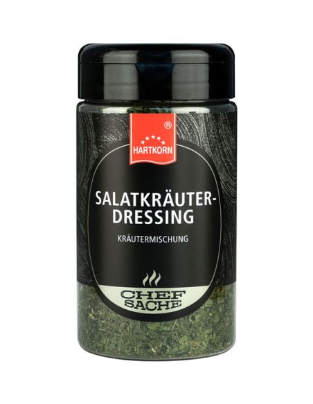 Schwarze Gewürzdose mit grünem Etikett und der Aufschrift „Salatkräuter“. Schwarze Gewürzdose mit grünem Etikett und der Aufschrift „Salatkräuter“.