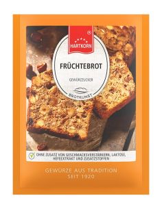 Orangefarbener Flachbeutel mit der Aufschrift „FRÜCHTEBROT“, bebildert mit fruchtigem Brotscheiben.