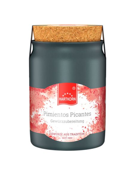 Schwarze Keramiktöpfchen mit der Aufschrift „Pimientos Picantes Gewürzzubereitung“.