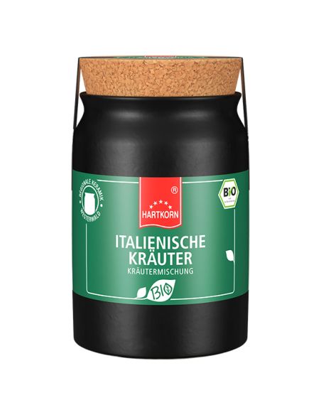 Schwarzes Keramiktöpfchen mit grünem Etikett und Korkdeckel, Aufschrift „Italienische Kräuter“.