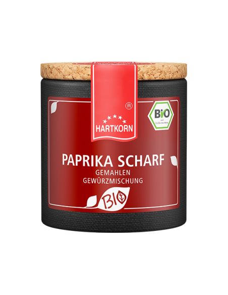 Tiefrote Pappdose mit Korkdeckel und rotem Etikett, beschriftet mit „Paprika scharf – Bio“.
