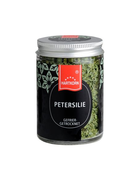 Hartkorn Gewürzglas mit grünem, gefriergetrocknetem Petersilie, schwarzes Etikett mit weißer Schrift und rotem Hartkorn-Logo.