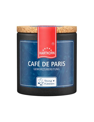 Eine dunkelblaue Pappdose mit Korkdeckel und rotem Etikett, beschriftet mit "Café de Paris".