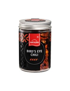 Glas mit getrockneten Bird’s Eye Chilischoten und Schraubdeckel – Hartkornlogo