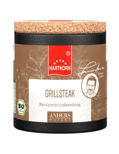 Eine Pappdose mit Korkdeckel und dunkelbraunem Etikett mit der Aufschrift „Grillsteak“.