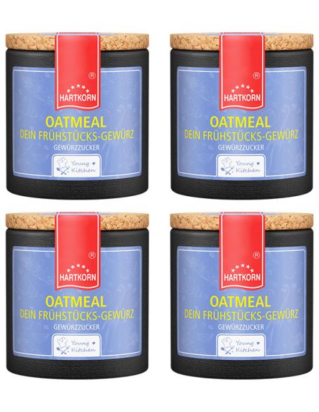 Vier schwarze Pappdosen mit blauem Etikett mit der Aufschrift „OATMEAL“.