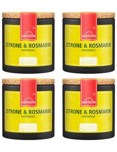 Vier schwarze Keramiktöpfchen mit gelbem Etikett und rotem Band, Aufschrift: „Zitrone & Rosmarin“.