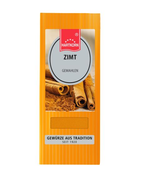 Orangefarbene Verpackung mit ovalem Ettiket und der Aufschrift "Zimt" mit einem Bild von Zimtstangen. Orangefarbene Verpackung mit ovalem Ettiket und der Aufschrift "Zimt" mit einem Bild von Zimtstangen.