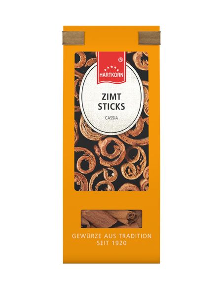 Orangefarbener Flachbeutel mit Nahaufnahme von Zimtstangen und Sichtfenster. Orangefarbener Flachbeutel mit Nahaufnahme von Zimtstangen und Sichtfenster.