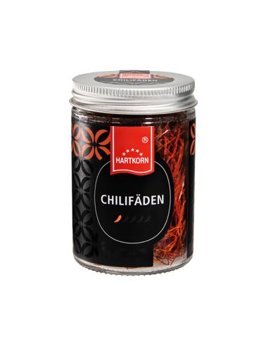 Glas mit Hartkorn Chilifäden – feine, rote Chilischnüre mit milder Schärfe (1 Chilischote auf Etikett)