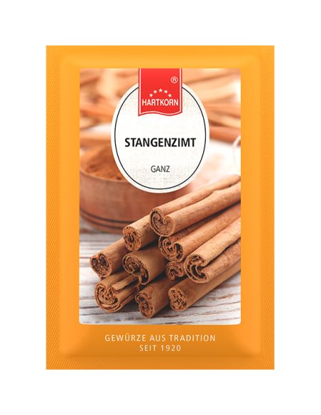 Flachbeutel mit mehreren hellbraunen Zimtstangen, gelb gestreift.