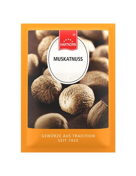 Flachbeutel mit mehreren braunen Muskatnüssen, goldgelb gestreift. Flachbeutel mit mehreren braunen Muskatnüssen, goldgelb gestreift.
