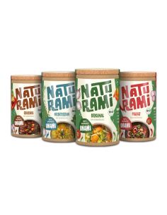 Vier runde Pappdosen mit Korkdeckel in den Sorten Original, Mediterran, Pikant und Rauchig nebeneinander.