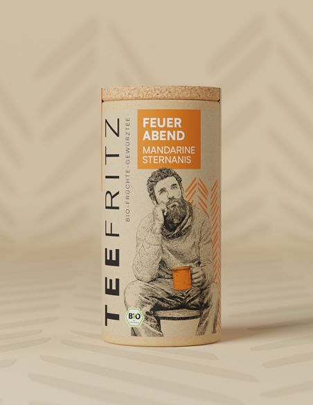 Teefritz Dose „Feuer Abend“ Mandarine Sternanis, mit Illustration eines Mannes mit Schal und orangefarbenem Etikett.