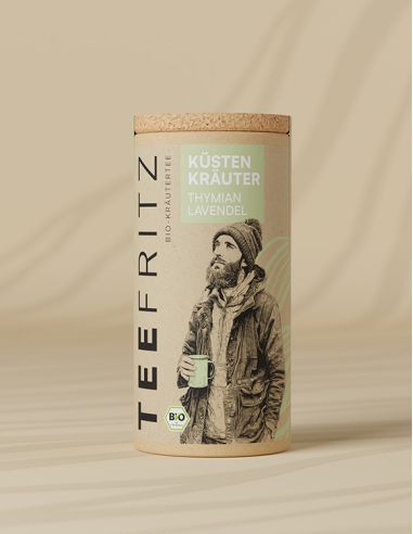 Teefritz Dose „Küsten Kräuter“ Thymian Lavendel, mit Illustration eines Mannes mit Mütze und hellgrünem Etikett.