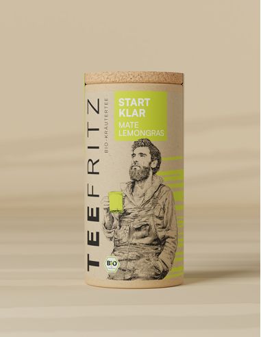 Teefritz Dose „Start Klar“ Mate Lemongras, mit Illustration eines Mannes mit Becher und grünem Etikett.