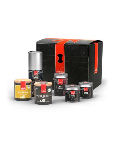 Schwarze Geschenkbox mit sechs Pfefferprodukten.