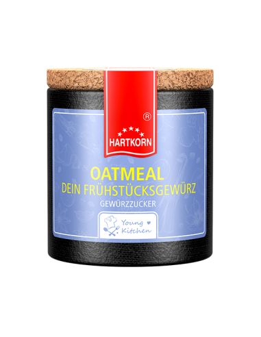 Pappdose mit Korkdeckel und rotem Etikett, beschriftet mit „Oeatmeal, Dein Frühstücksgewürz"
