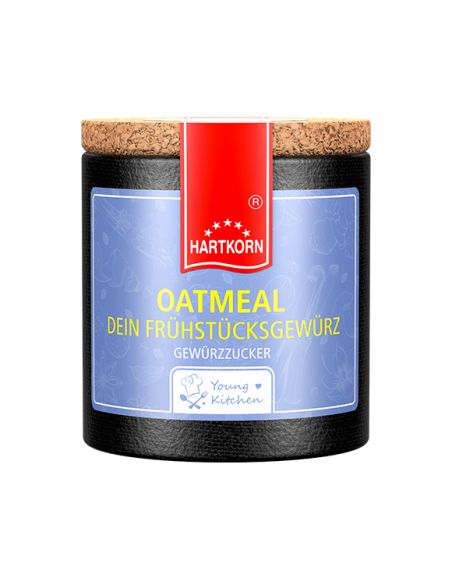 Pappdose mit Korkdeckel und rotem Etikett, beschriftet mit „Oeatmeal, Dein Frühstücksgewürz"