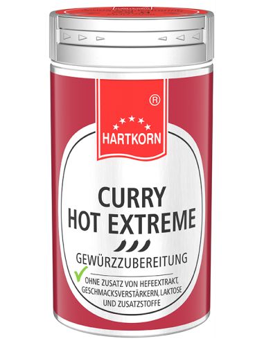 Kleine silberne Metalldose mit rotem Etikett, Aufschrift: „CURRY HOT EXTREME“.