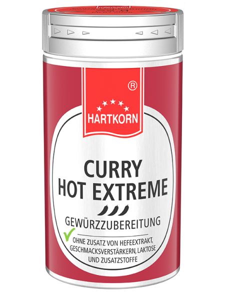 Kleine silberne Metalldose mit rotem Etikett, Aufschrift: „CURRY HOT EXTREME“.