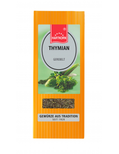 Flachbeutel mit der Aufschrift „THYMIAN gerebelt“, grüne Kräuterzweige im Hintergrund.